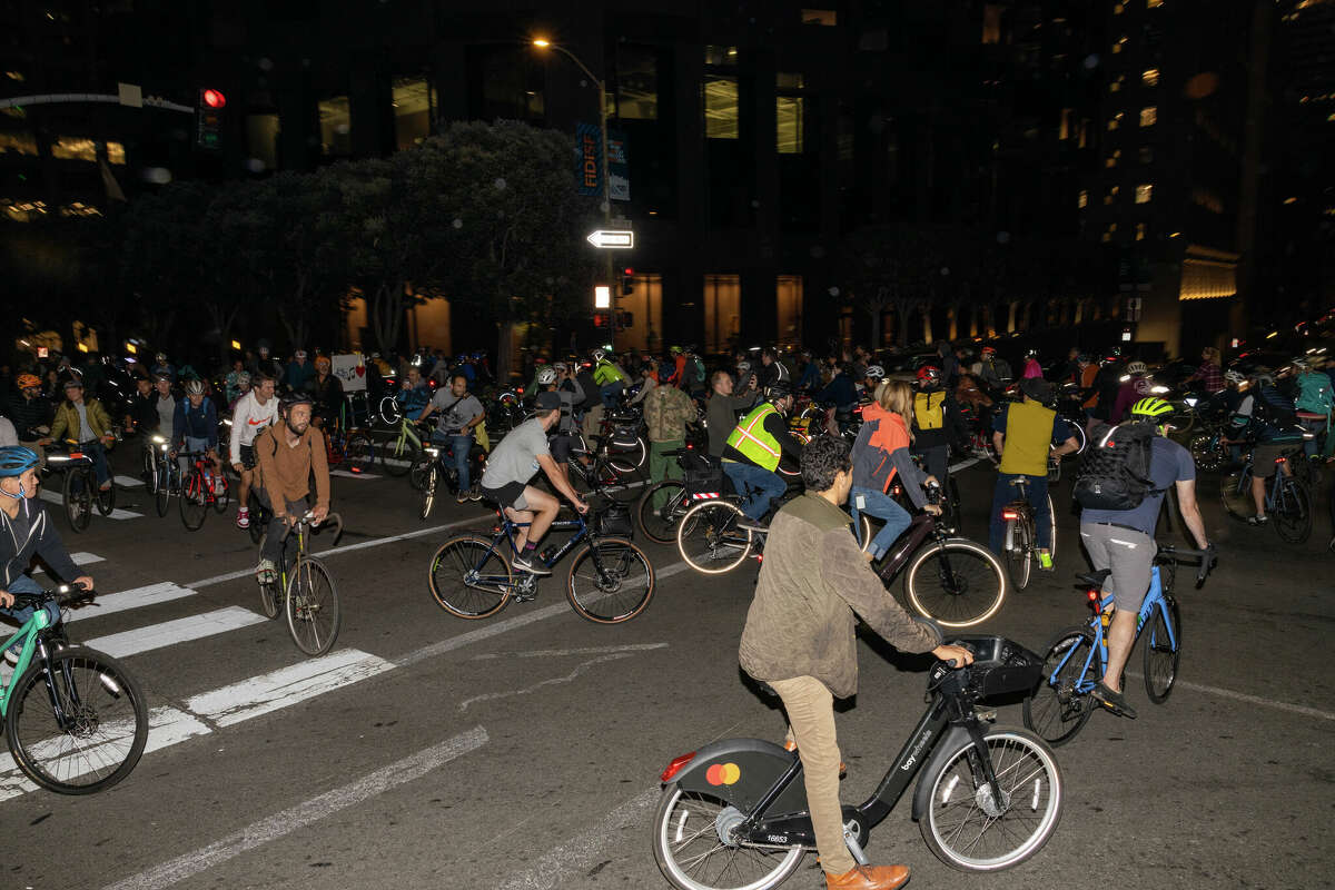 Critical Mass riders congregate on Kearny Street on September 30, 2022.