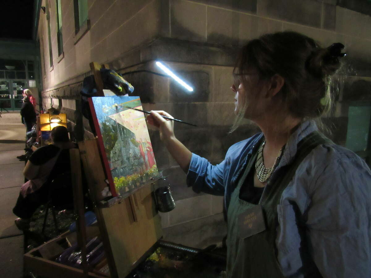 Sarah Lorentz was one of two St. Louis artists live-painting the free Opera Edwardsville concert on Friday. 