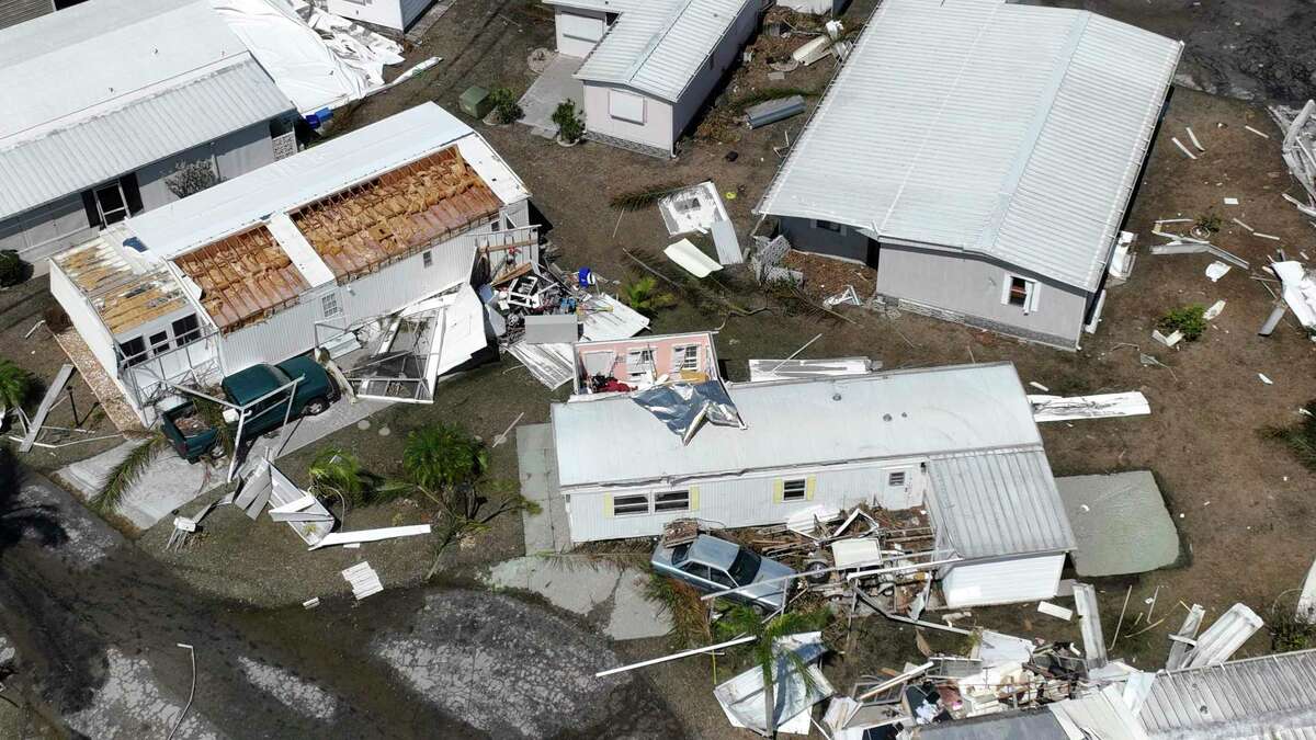 Damage to a trailer park in Fort Myers, Fla., is seen Saturday, Oct. 1, 2022, after Hurricane Ian passed by the area.
