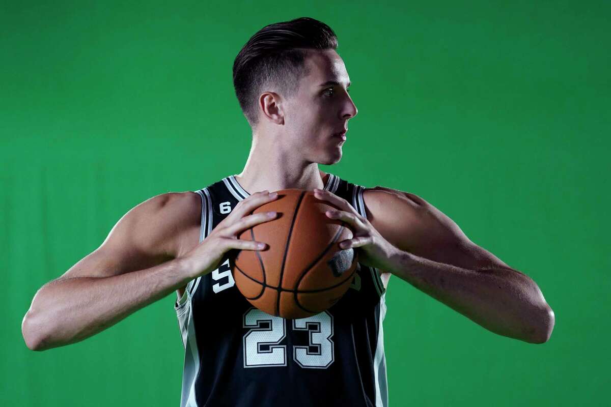 San Antonio Spurs forward Zach Collins (23) poses for photos during the team's NBA media day, Monday, Sept. 26, 2022, in San Antonio. (AP Photo/Eric Gay)