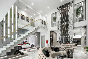 This glitzy Texas home pays homage to Formula 1, 'Tron,' Versace