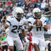 UConn quarterback Zion Turner (R) and running back Devontae Houston (L) in a game against Fresno State on Saturday at Rentschler Field.