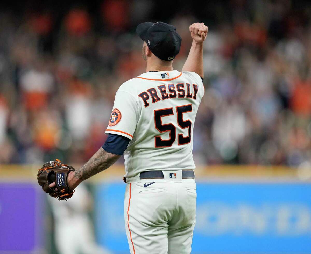 Houston Astros relief pitcher Ryan Pressly (55) gives a fist-pump after getting Tampa Bay Rays Harold Ramirez to line out to center field and end the ninth inning of a MLB baseball game at Minute Maid Park on Saturday, Oct. 1, 2022, in Houston. Houston won the game 2-1.