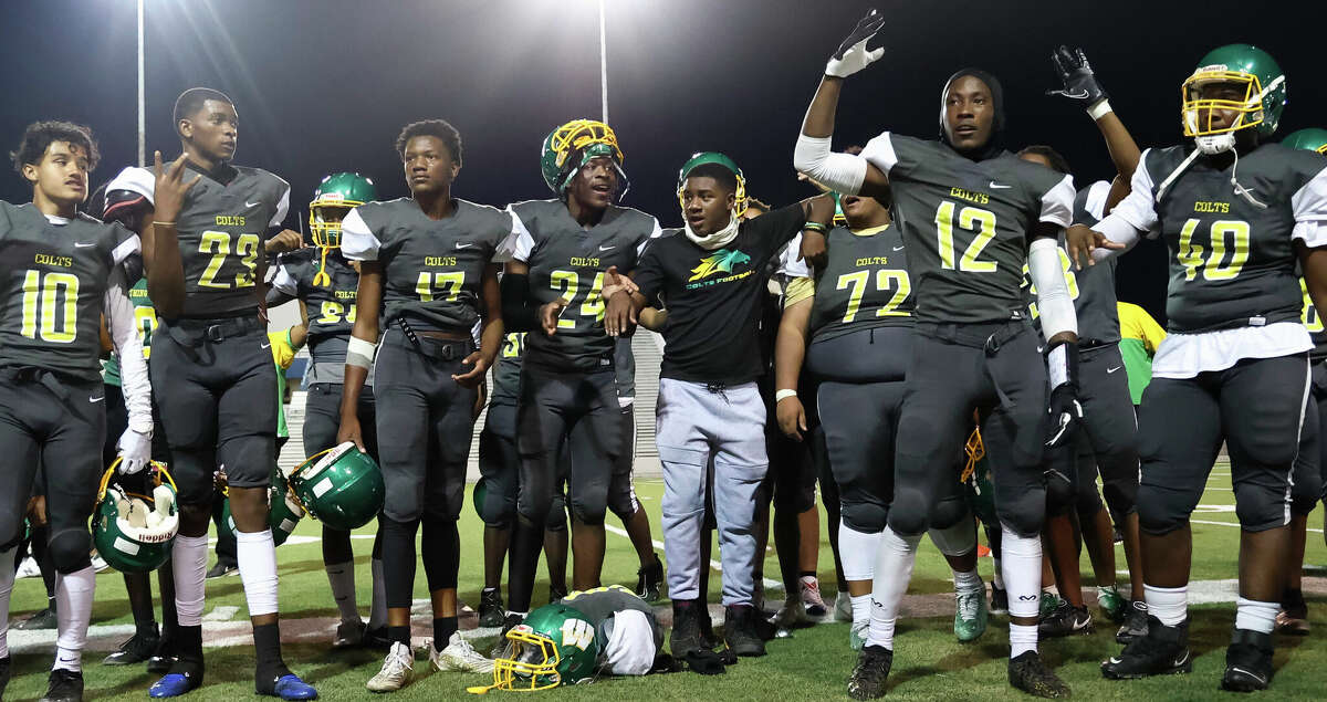 Worthing Colts players celebrate after a win of their District 11-4A Division I high school football game between the Worthing Colts and the Kashmere Rams at Delmar Stadium in Houston, TX on Saturday, October 1, 2022.