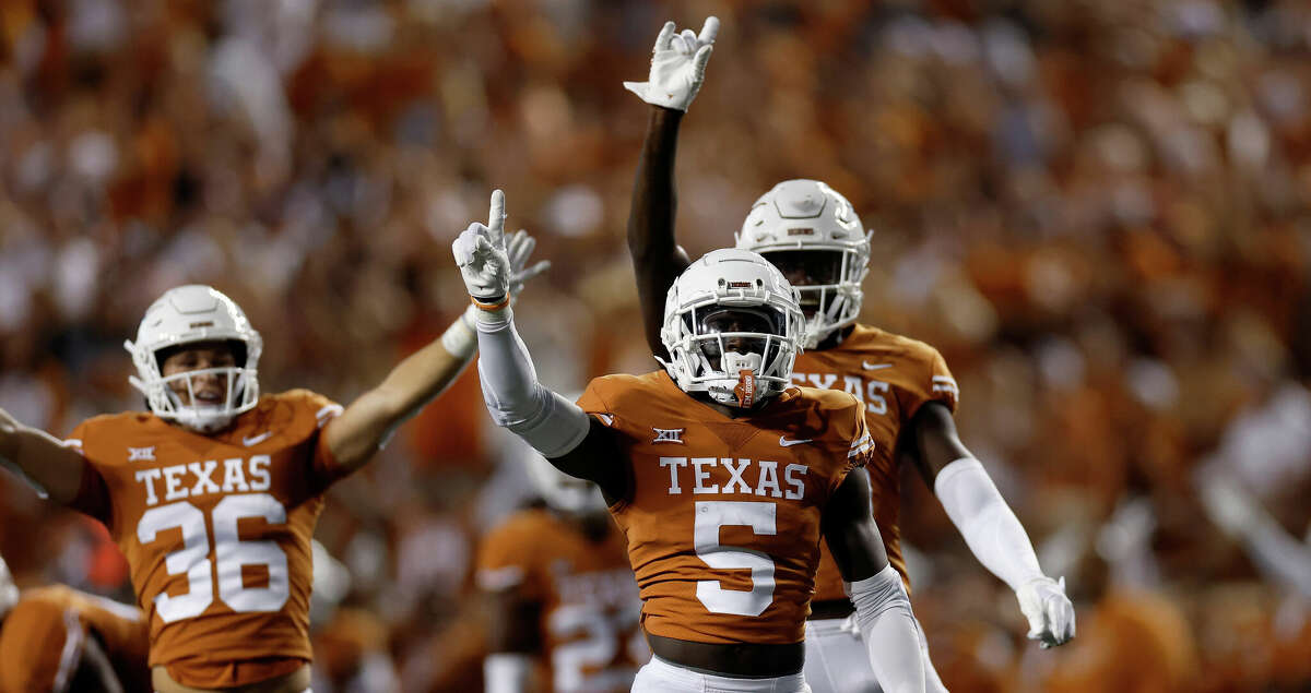 D'Shawn Jamison #5 of the Texas Longhorns celebrates after defending a pass in the second quarter against the West Virginia Mountaineers at Darrell K Royal-Texas Memorial Stadium on October 01, 2022 in Austin, Texas. (Photo by Tim Warner/Getty Images)