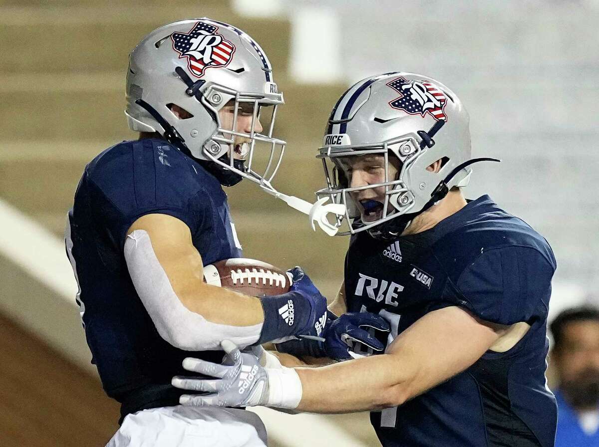 Rice Owls running back Dean Connors (0) is congratulated by tight end Jack Bradley (87) after a touchdown reception in the fourth quarter of a football game against the UAB Blazers in Houston, Saturday, Oct. 1, 2022.