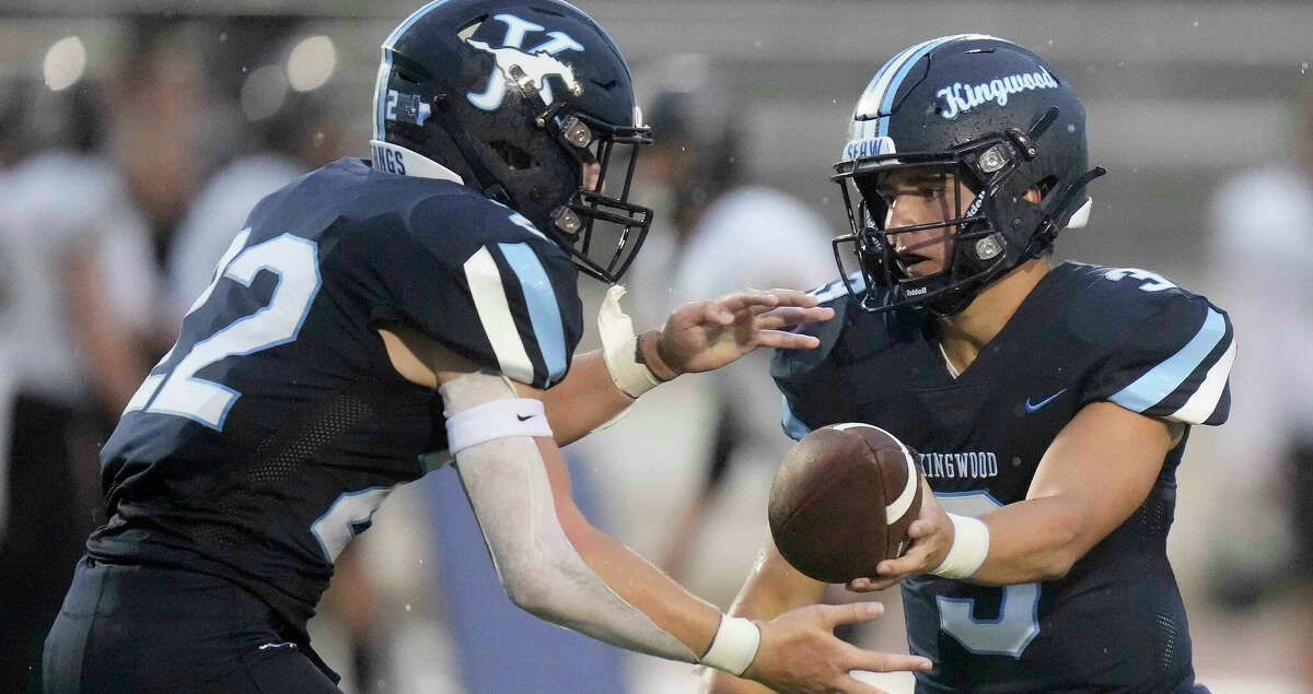 Kingwood quarterback Trey Reese (3) hands off to running back Adam Graham during the first half of a high school football game against Jordan, Saturday, Sept. 3, 2022, in Humble, TX.