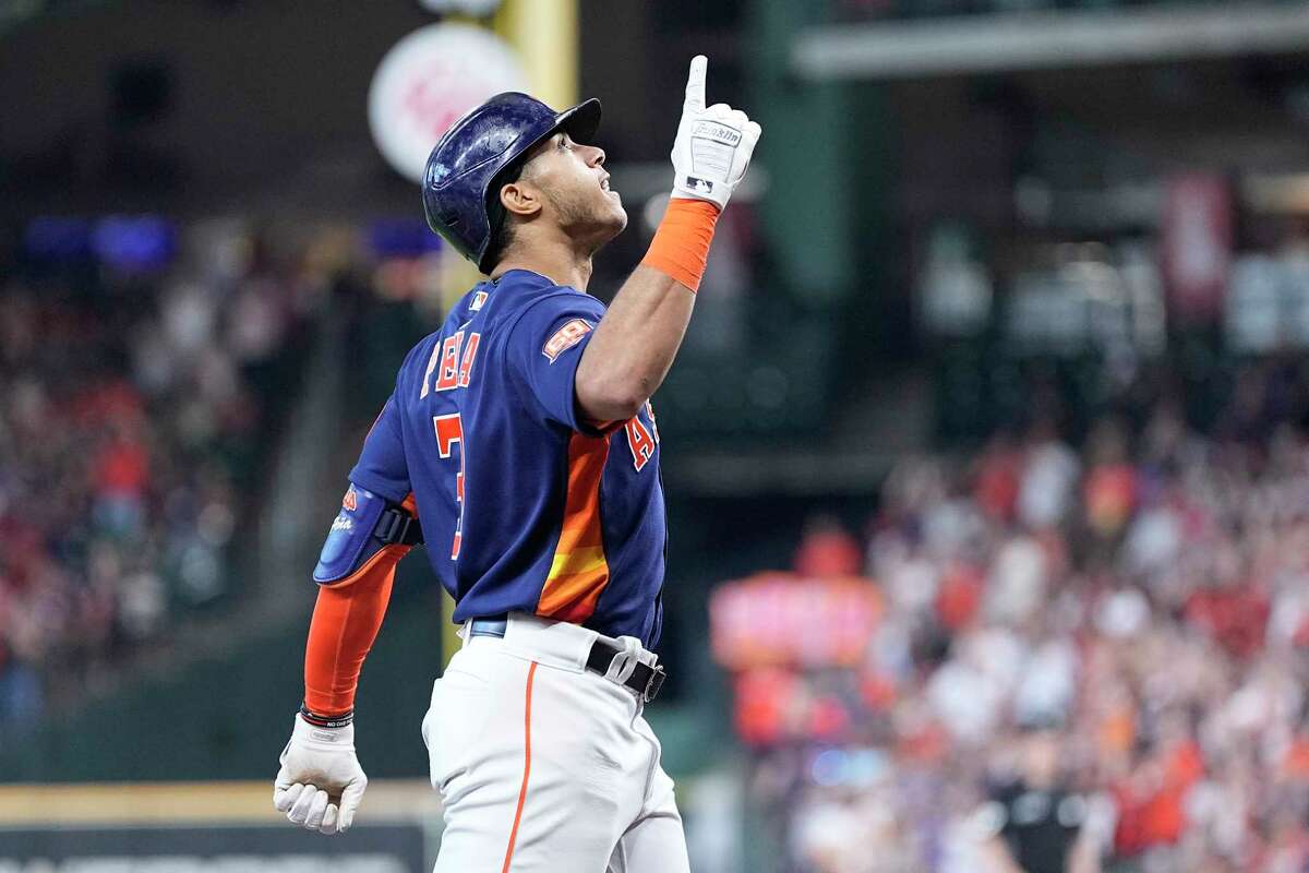 Houston Astros' Jeremy Pena celebrates after hitting a two-run home run off Tampa Bay Rays starting pitcher Corey Kluber during the first inning of a baseball game Sunday, Oct. 2, 2022, in Houston. (AP Photo/Kevin M. Cox)