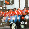Members of the 2001 Edwardsville football team ride on a flatbed truck during the Homecoming parade.
