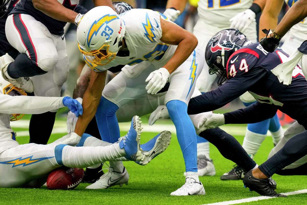 Houston Texans linebacker Blake Cashman (53) recovers the ball