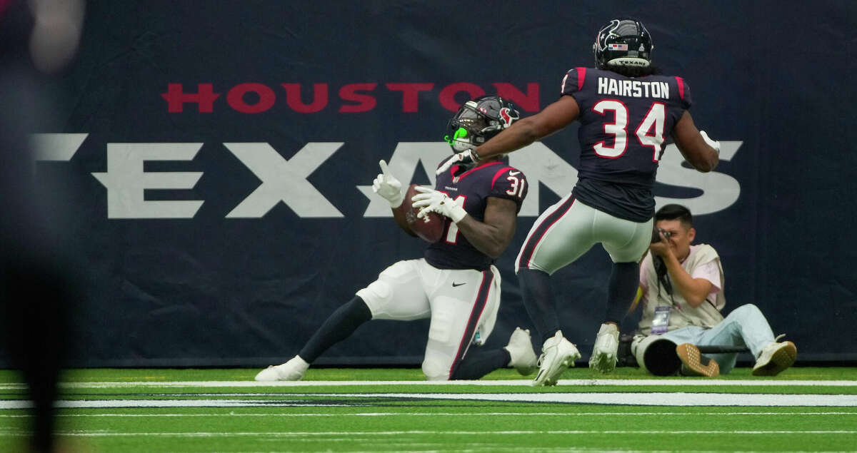 Houston Texans running back Dameon Pierce (31) celebrates his touchdown during the second quarter of the NFL game against the Los Angeles Chargers Sunday, Oct. 2, 2022, at NRG Stadium in Houston.