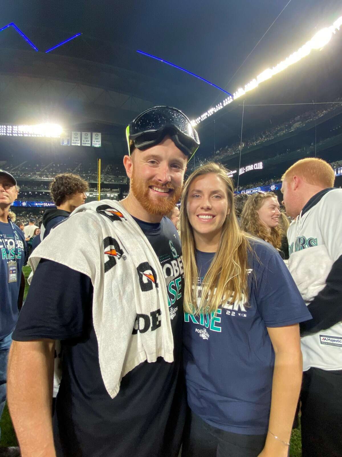 The Mariners’ Brian O’Keefe is seen with Emily Nonnemacher, his fiancée, after O’Keefe joined the big leagues  Friday, Sept. 30, 2022 at T-Mobile Park in Seattle, the day the Mariners clinched the playoffs for the first time in 20 years. He got his first start and first Major League hit on Saturday. (Photo by Susan O'Keefe)