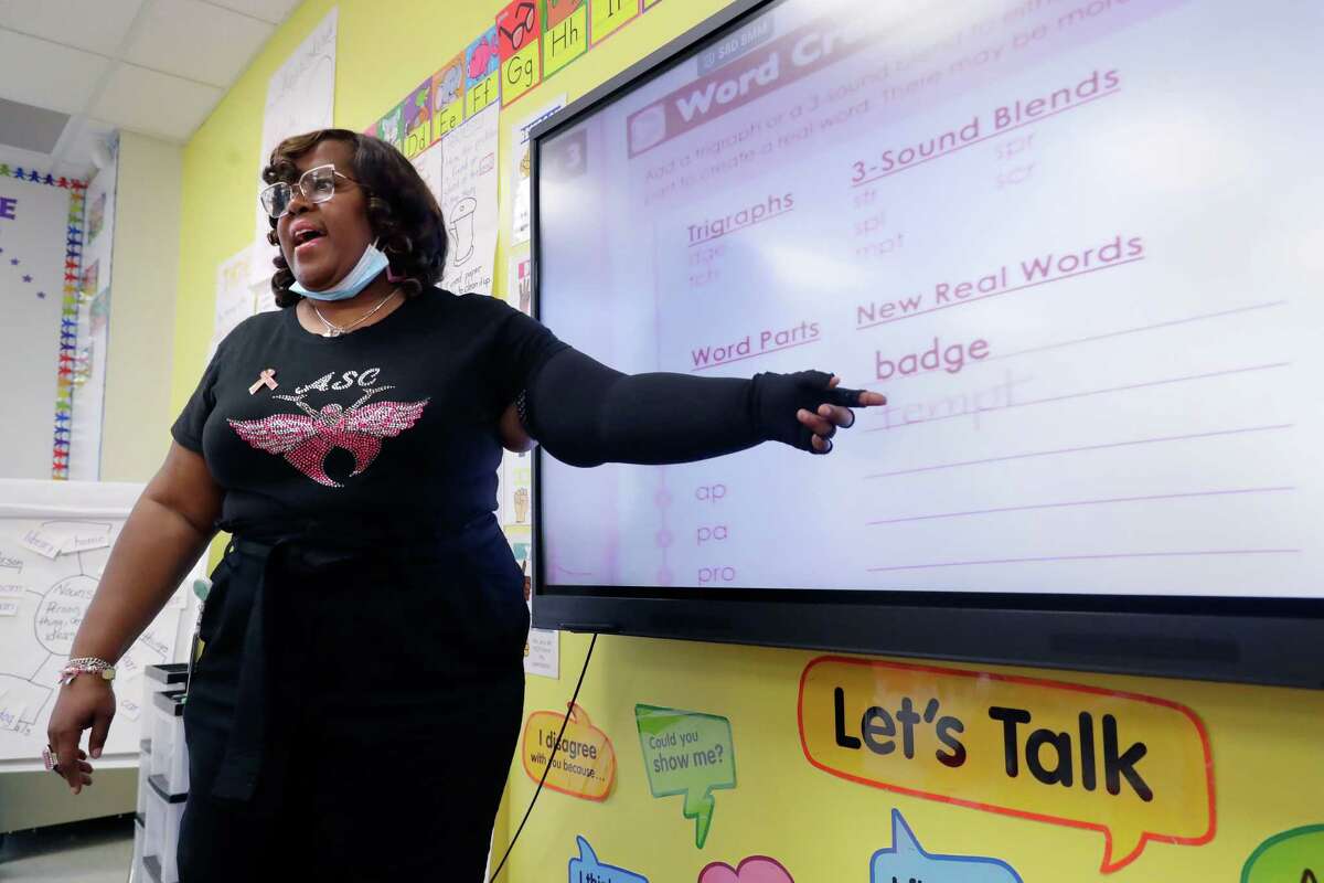 Kimberly Richardson, a cancer survivor, teaches a second grade class at Lockhart Elementary School Friday, Sept. 30, 2022 in Houston, TX.