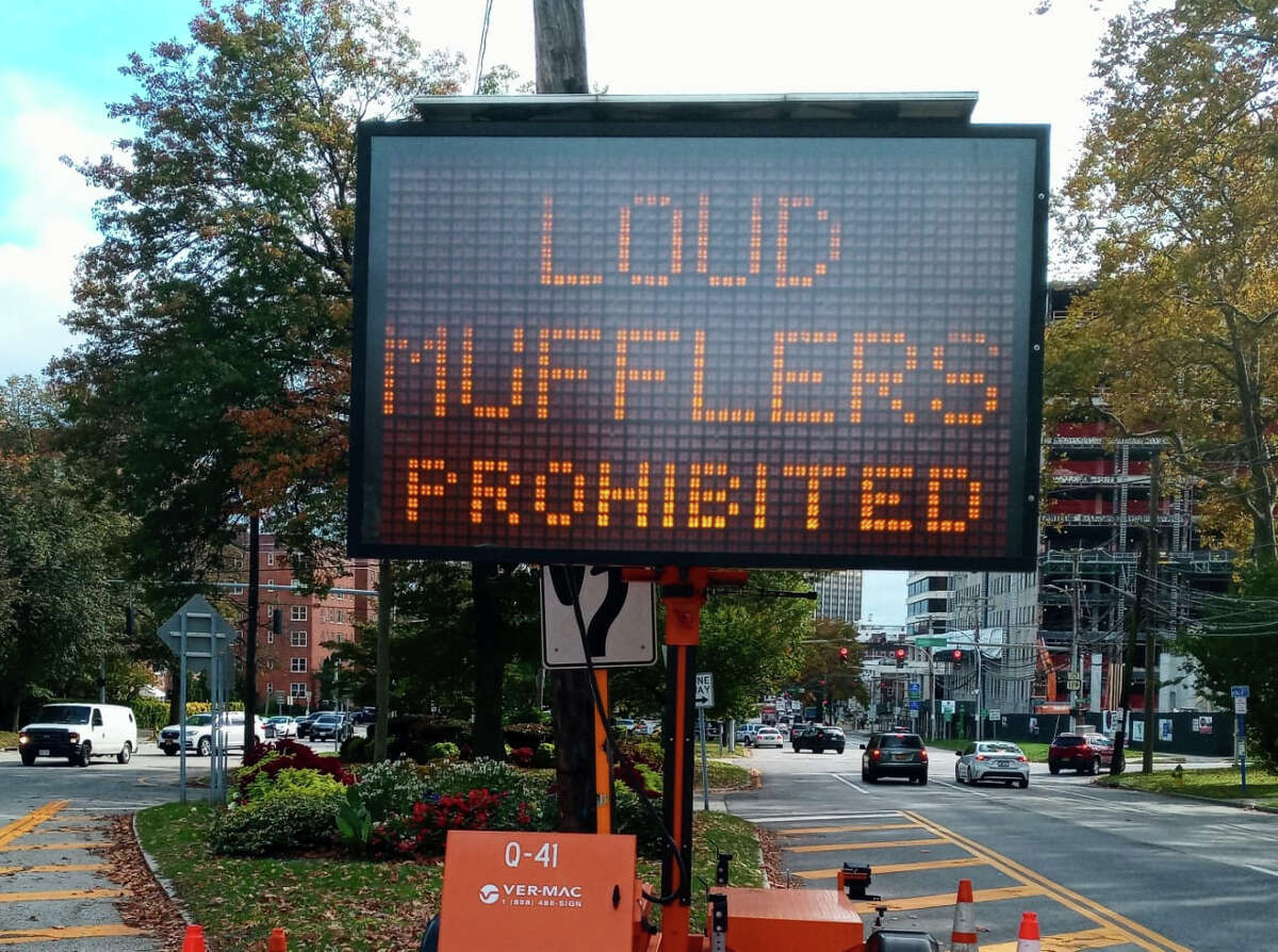 A sign warning about the use of loud mufflers in White Plains in 2021. In the Hudson Valley, enforcement of noise ordinances usually falls to local police.
