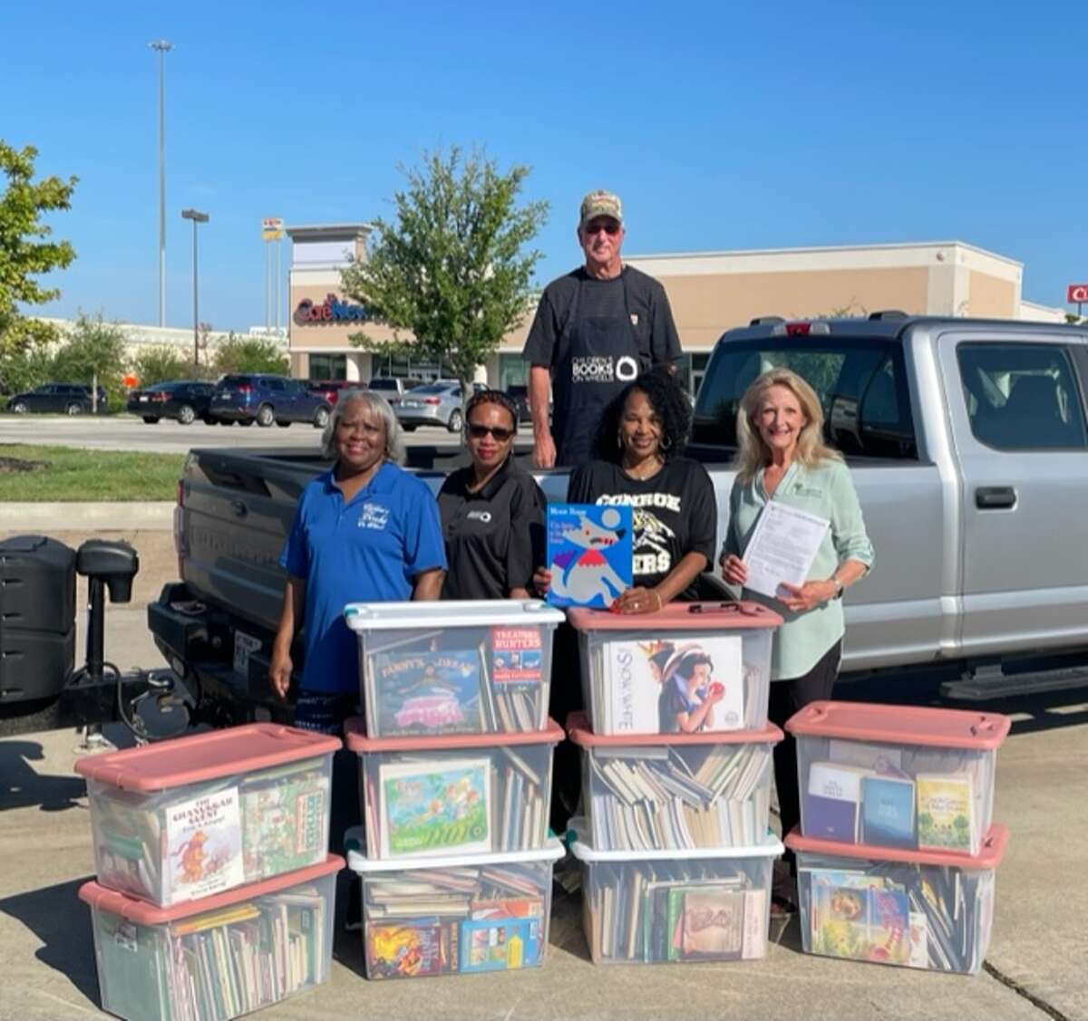Children's Books on Wheels, a Conroe area literacy nonprofit, delivered around 4,000 free books to the Uvalde Consolidated Independent School District with the help of Helen and Jim Thornton, who delivered the books on their way to a hunting trip. Constance Borders, left, Mary Butler, Jim Thornton, Rita Wiltz, and Helen Thornton are shown. 