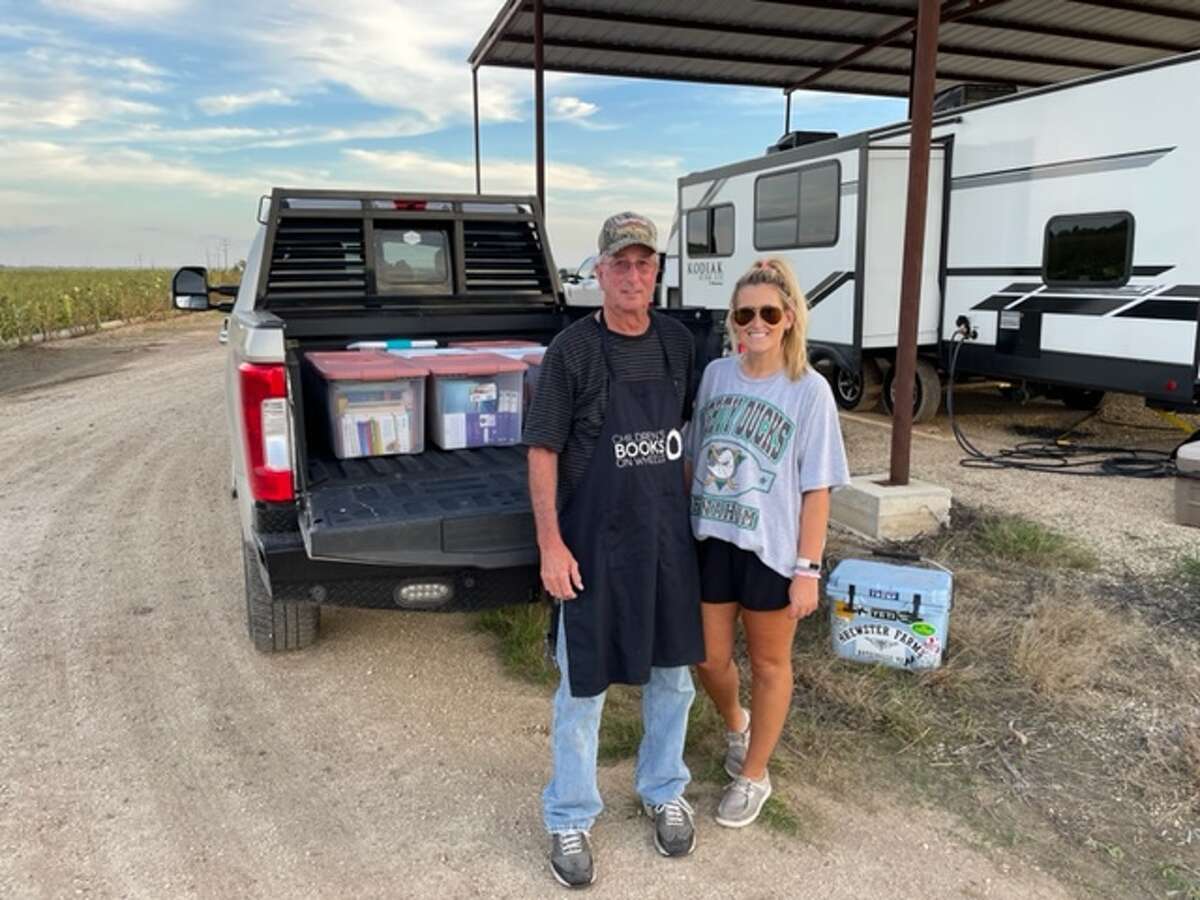 Children's Books on Wheels, a Conroe area literacy nonprofit, sent around 4,000 free books to the Uvalde Consolidates Independent School District with the help of Jim and Helen Thornton. The Thornton's, pictured with their truck full of books, delivered the donation themselves because the shipping cost was too much for the nonprofit.