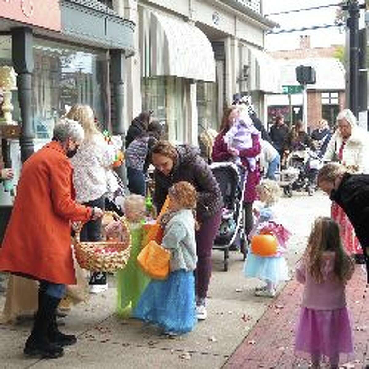 The Darien Community Association is preparing for the 2022 Mom's Morning In Halloween Parade as the event continues a 28-year tradition for the town's youngest residents. Preschool-age children are invited to dress up for Halloween, and go trick-or-treating with their caretakers at local merchants along the Post Road in Darien with the parade of trick-or-treaters stepping off at 10 a.m. Friday, October 28, with children their caretakers, and bags for treats, and attendees being asked to meet up in the parking lot that is next to the Darien Fire Station, which is located at 848 Boston Post Road in the town, and which is across from the Post Corner Pizza business, which is located at 847 Post Road, also in the town. A photo that was submitted for the event, is shown.