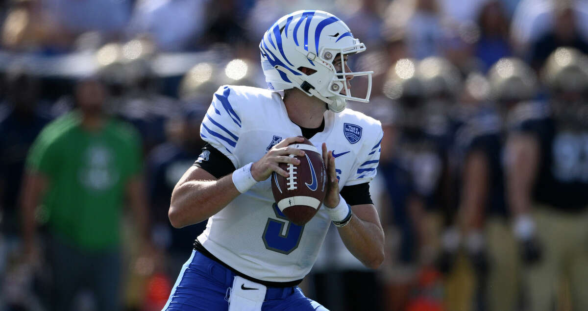 Memphis quarterback Seth Henigan (5) in action during the first half of an NCAA college football game against Navy, Saturday, Sept. 10, 2022, in Annapolis, Md. (AP Photo/Nick Wass)