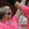 Jacksonville players celebrate after beating Routt in the annual Volley for a Cure match Monday night at The JHS Bowl.