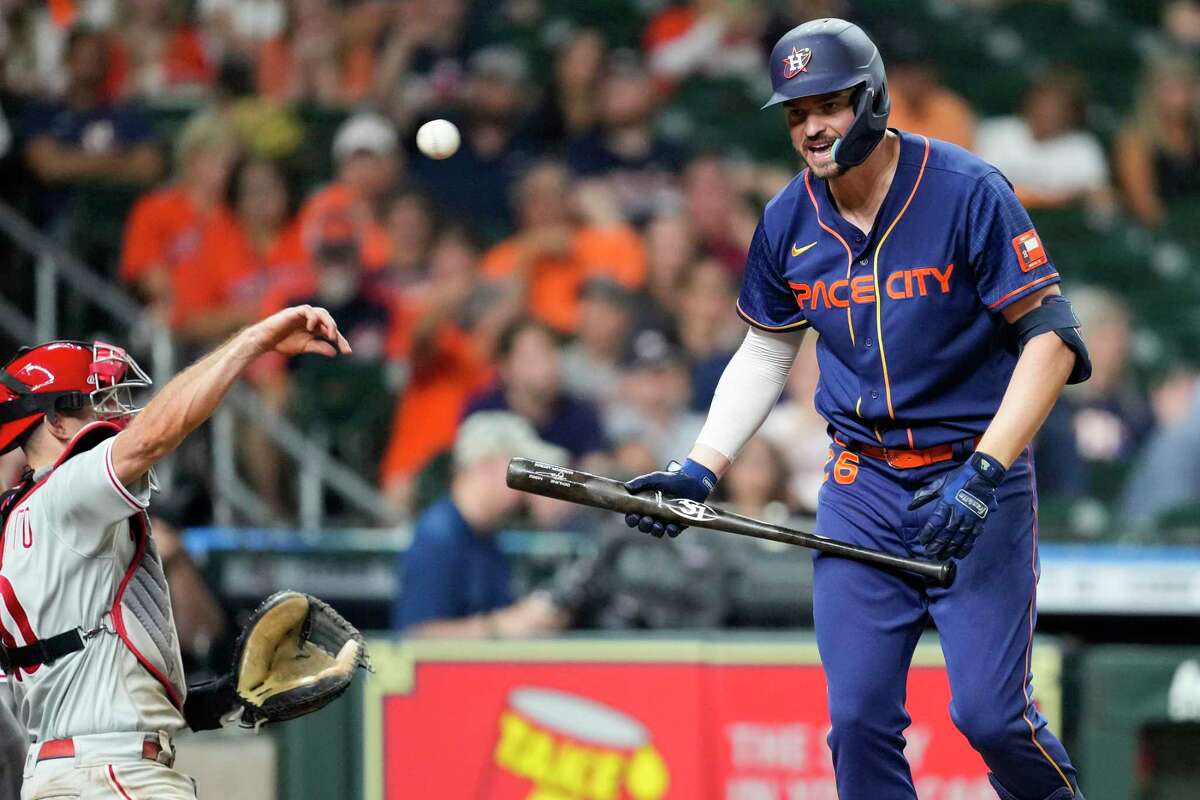 Houston Astros Trey Mancini (26) reacts after striking out against the Philadelphia Phillies during the eighth inning of a Major League Baseball game on Monday, Oct. 3, 2022, in Houston.