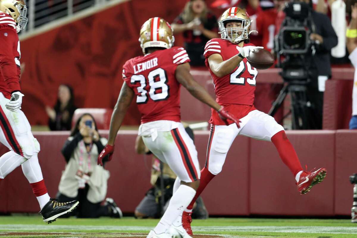 San Francisco 49ers’ Talanoa Hufanga celebrates his interception return for a touchdown in 4th quarter during Niners’ 24-9 win over Los Angeles Rams in NFL game at Levi’s Stadium in Santa Clara, Calif., on Monday, October 3, 2022.