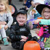 Darien kids dressed in Halloween costumes at the Darien Community Association's annual Mom's Morning in Halloween Parade on Friday, Oct. 26, 2019 in Darien, Conn. Kids trick-or-treat at local merchants.