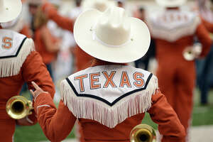 UT employee arrested in connection with assaulting Longhorn Band