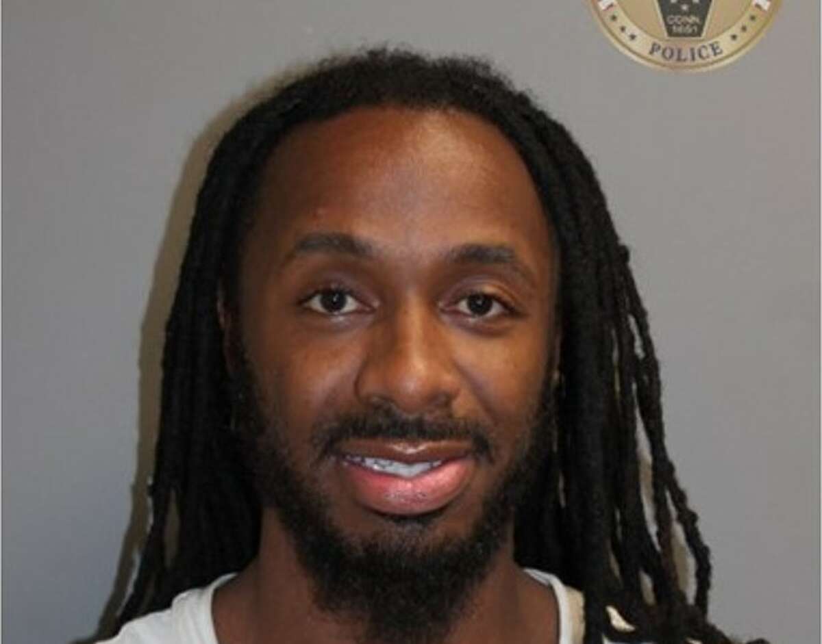 Christopher Polk, 32, of Norwalk, has been accused of hitting a youth football coach in the head with a helmet following a game Sunday at Brien McMahon High School. Polk told police it was over a dispute regarding an alleged prior incident, his arrest warrant stated.