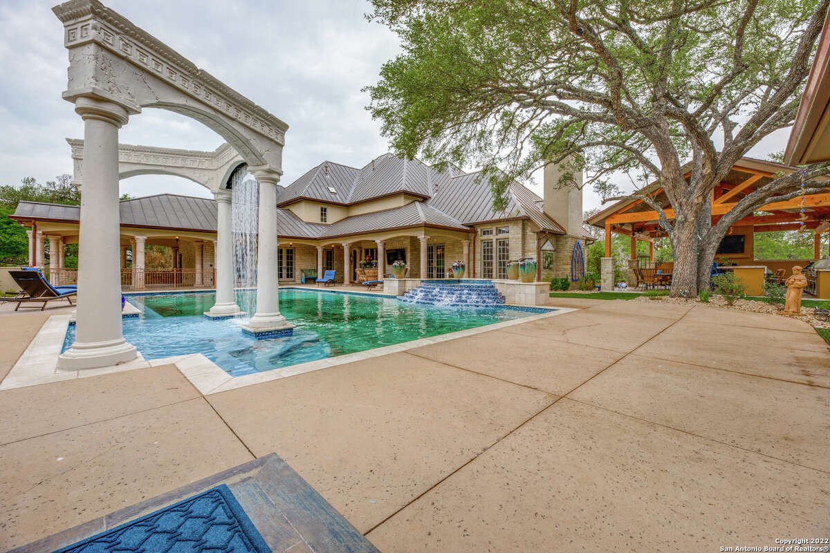 The property at 107 Greystone Cir near Boerne boasts a 6,292-square-foot main house with four bedrooms and four and a half bathrooms. 