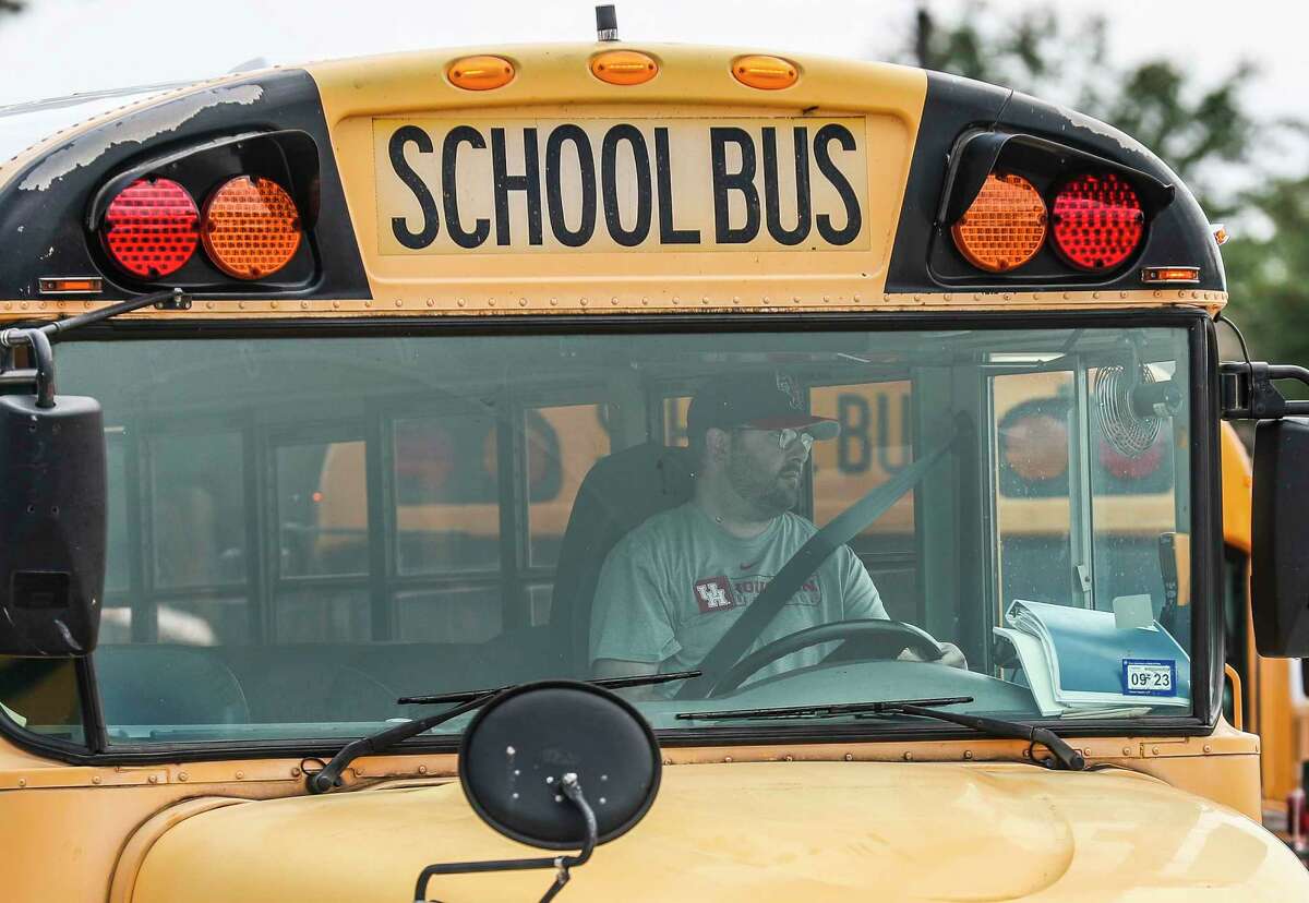 Bus driver Reina Reyes leaves the Conroe ISD Oak Ridge Transportation Center to pick up students, Tuesday, Oct. 4, 2022, in Oak Ridge North. The district’s transportation department is one of the areas that are seeing the strain of the district’s explosive growth in students, in addition to the growing bus driver shortage.
