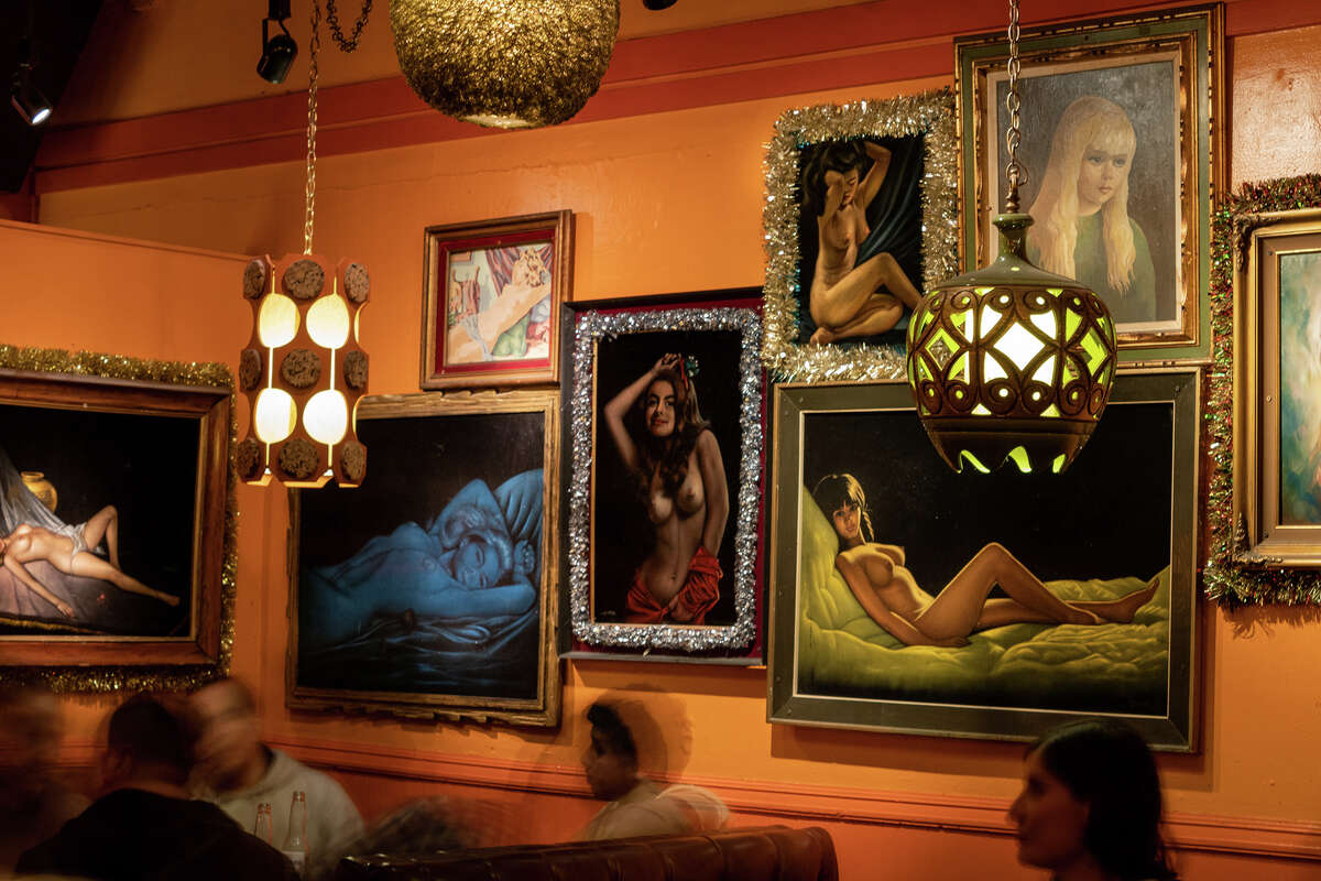 The ever-growing collection of 70s-era nude velvet portraits are a well-known part of the Casanova Lounge in San Francisco's Mission District, as seen on Saturday night, Sept. 17, 2022.