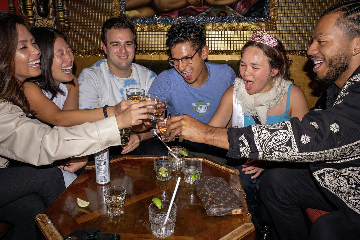 Candace Frazier, second from right, celebrates her 30th birthday with her squad at the coveted back table of the Casanova Lounge, on Saturday night, Sept. 17, 2022.