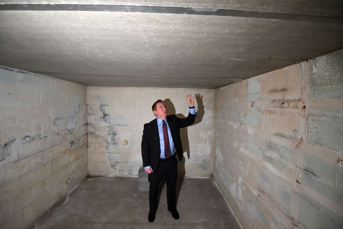 Homeowner Brian Sinkoff in the basement bomb shelter that came with the 1950s house on Friday, Sept. 30, 2022, in Slingerlands, N.Y.
