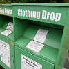 The clothing drop bin outside the Cos Cob Library in the Cos Cob section of Greenwich, Conn., photographed on Tuesday, Oct. 4, 2022. The area around the donation bins has seen frequently illegal textile dumping.