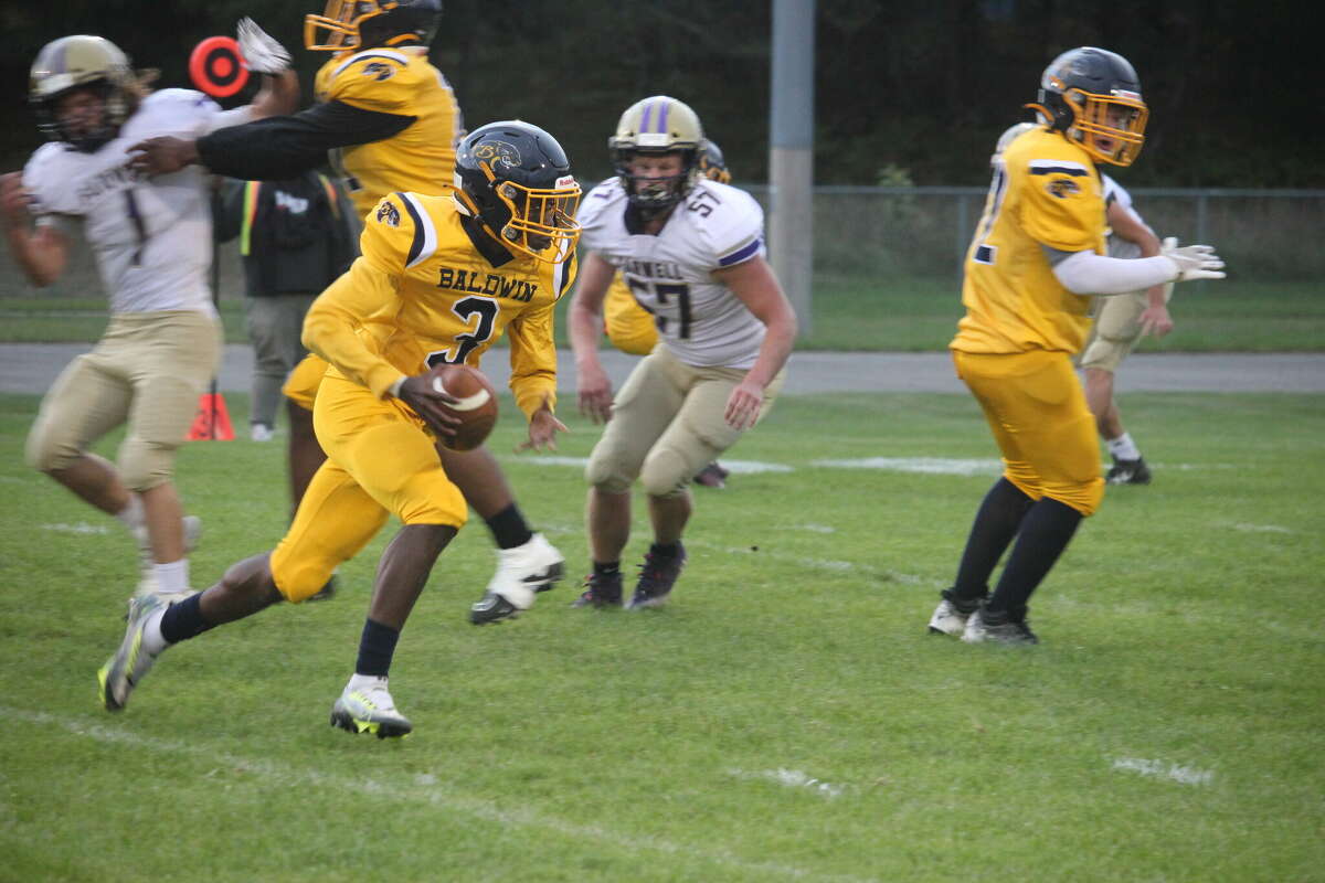 Carmelo Lindsey (3) looks for running room in Baldwin action earlier this season.