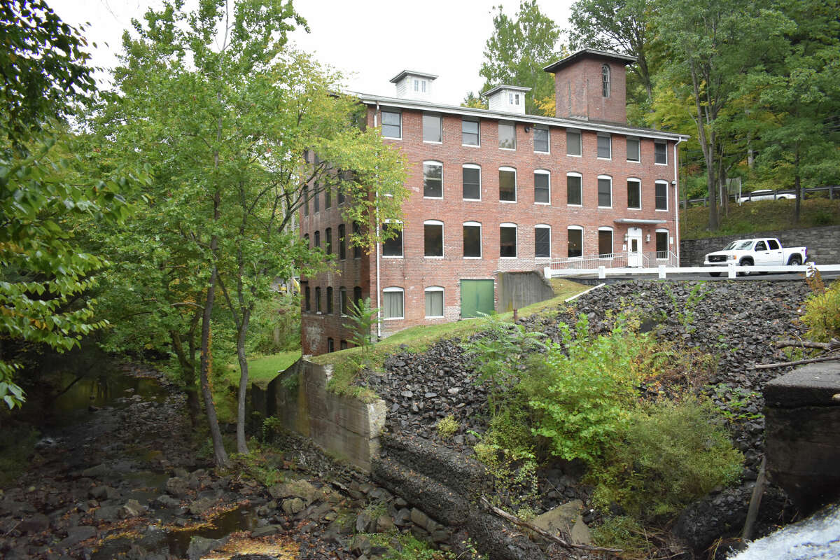 The historic Rocky Glen Falls mill building that serves as offices today, in October 2022 on Glen Road in Newtown, Conn.