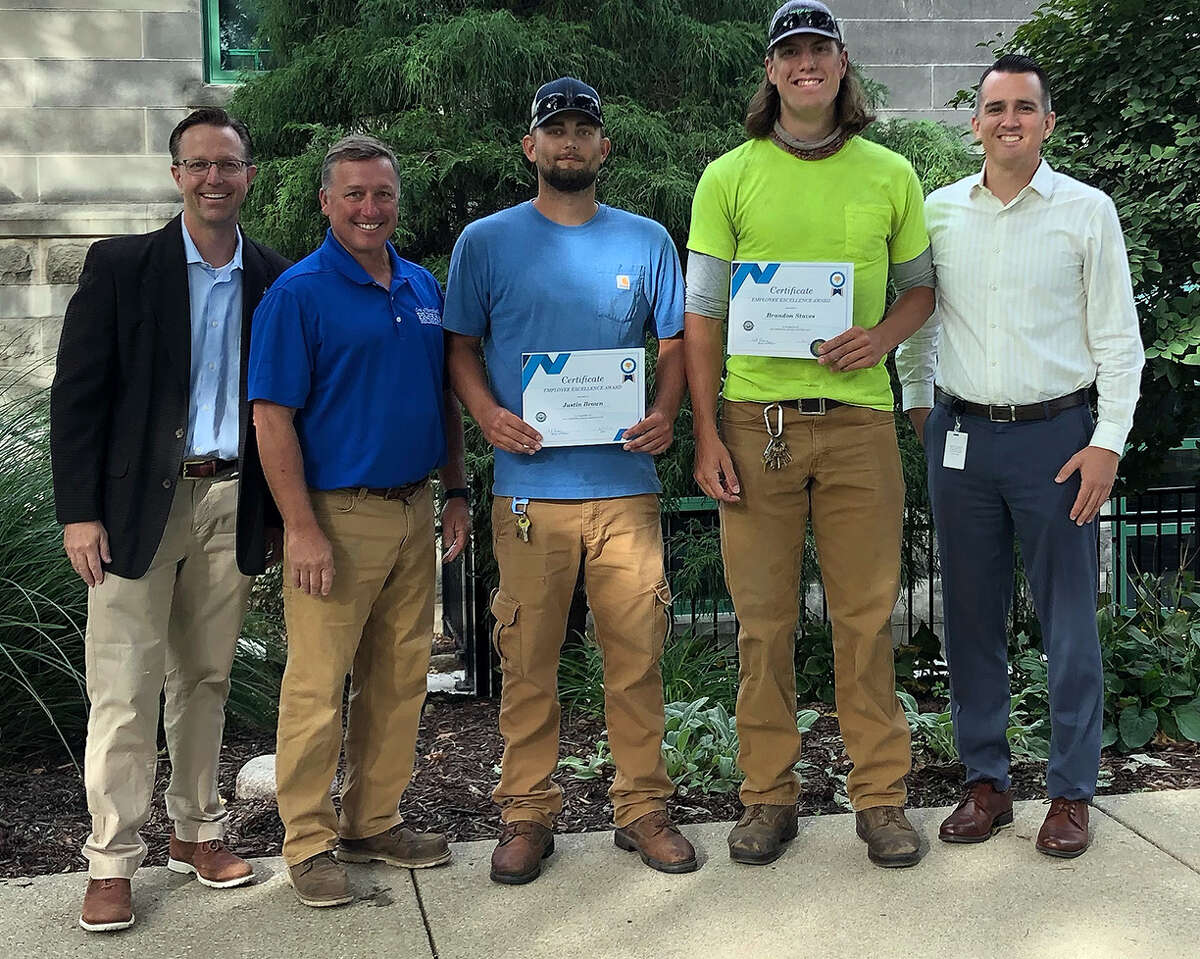 From left are: Mayor Art Risavy, Parks Foreman Darin Lee, Parks Laborers Justin Brown and Brandon Staves, and Parks amd Recreation Director Nate Tingley. Brown and Staves received Employee Excellence Awards for their efforts at the Criterium road race in August.