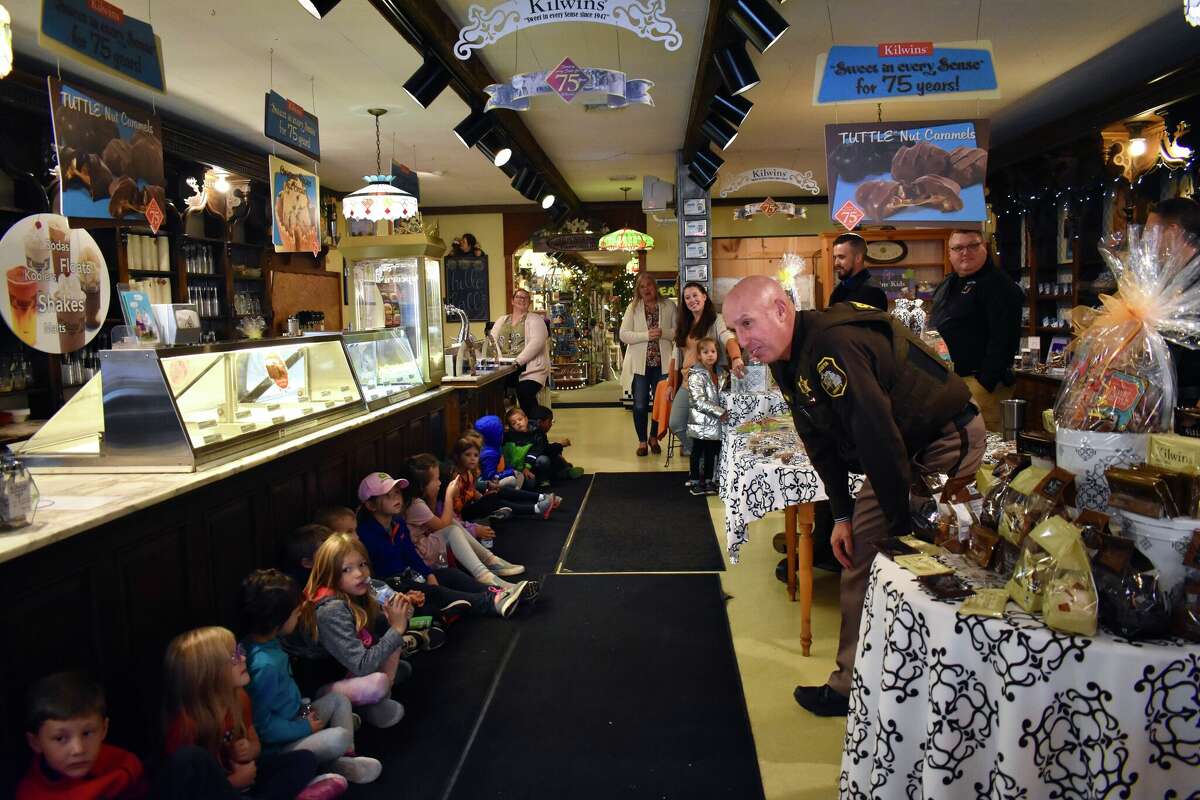 Big Rapids Brookside Elementary students gathered downtown at the Old Pioneer Store & Emporium to hear about the law enforcement profession from real local police officers.