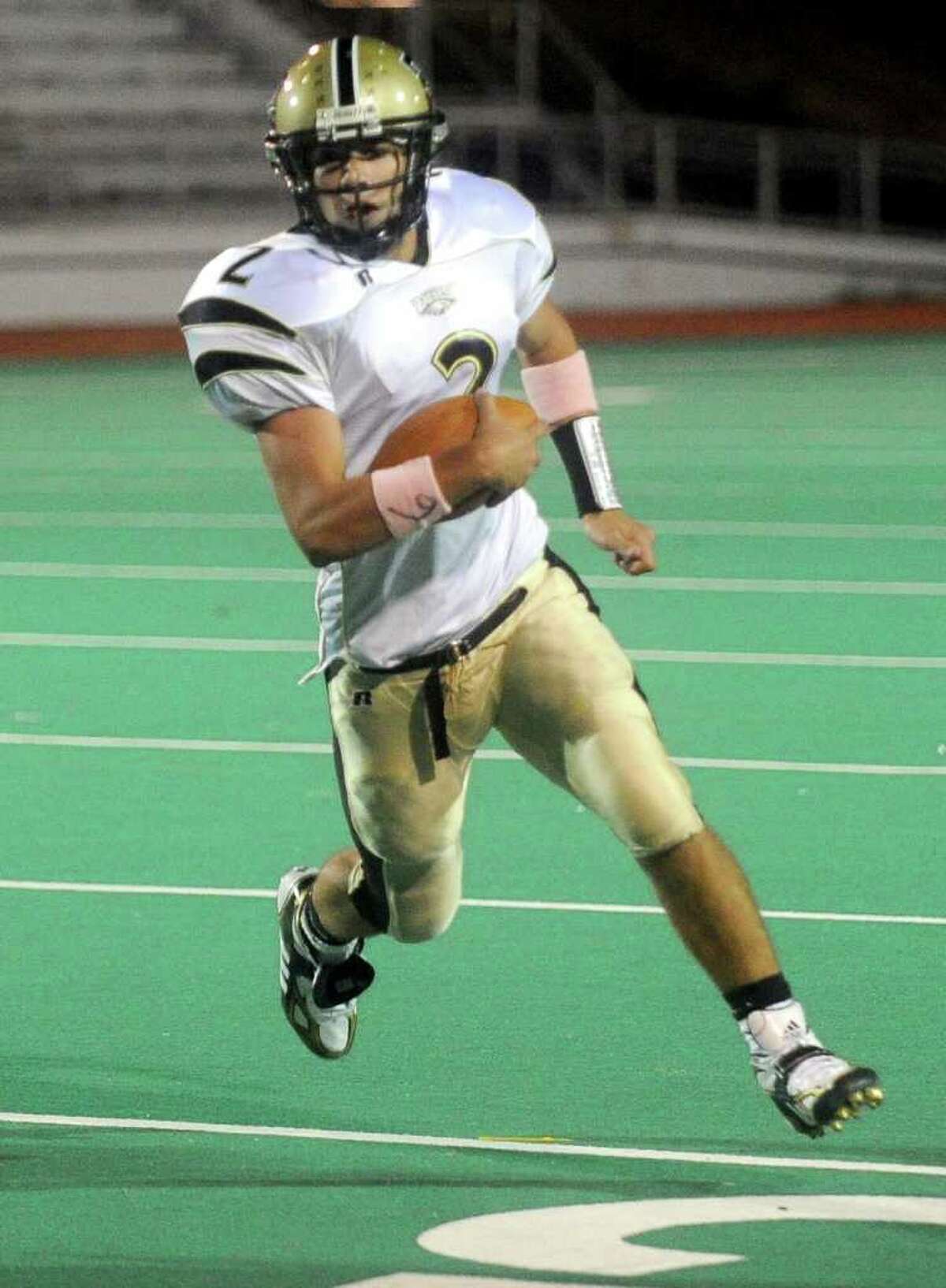 Trumbull's Phil Terio runs the ball during Friday's game at Bridgeport Central High School on October 8, 2010.