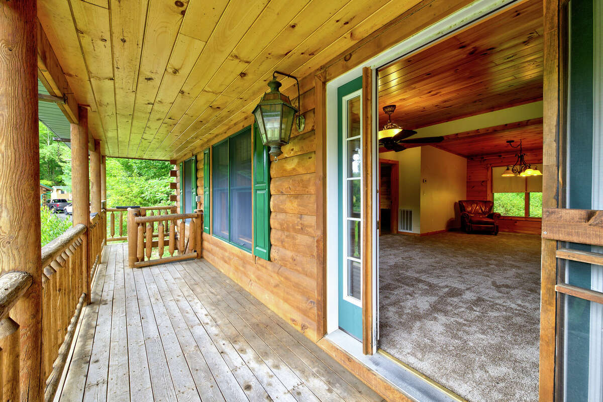 Two log homes for sale in Petersburgh, N.Y.