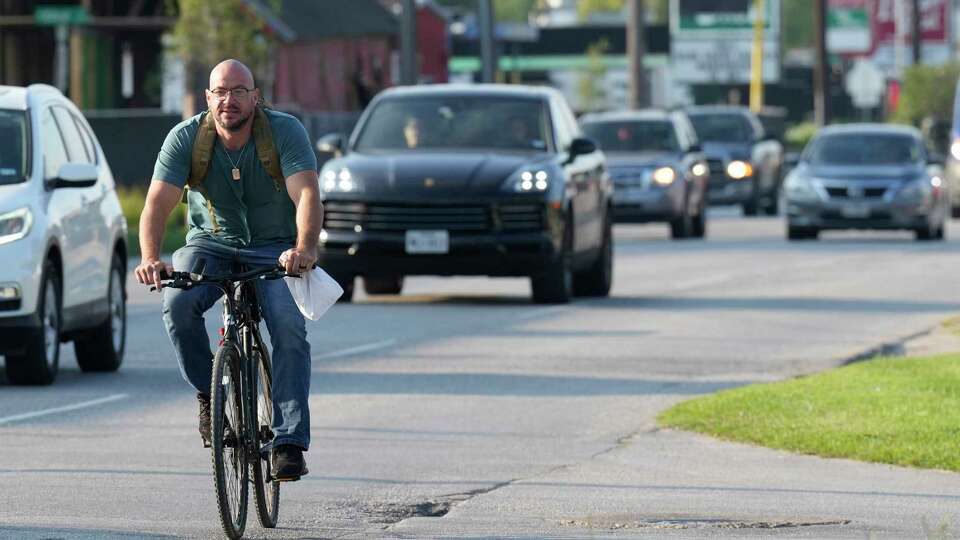 Story photo for Houston law giving cyclists room leads to few citations.