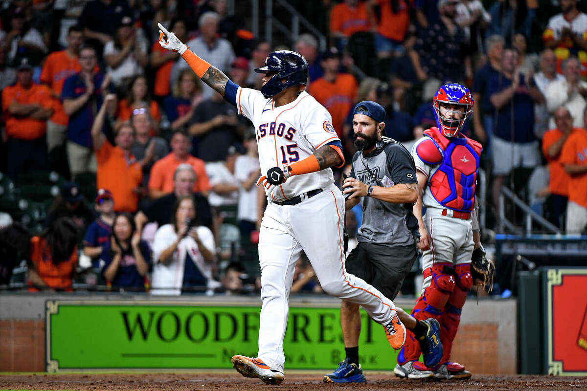 HOUSTON, TEXAS - OCTOBER 04: Martin Maldonado #15 of the Houston Astros celebrates after hitting a solo home run in the second inning against the Philadelphia Phillies at Minute Maid Park on October 04, 2022 in Houston, Texas. (Photo by Logan Riely/Getty Images)