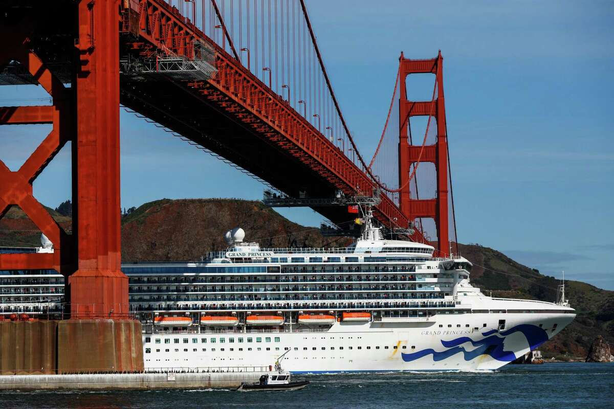 A Princess Cruise Line ship sails under the Golden Gate Bridge in 2020. The city of San Francisco is eseking more than $1 million in damages from Princess Cruise Lines and another company for a 2019 harbor mishap.