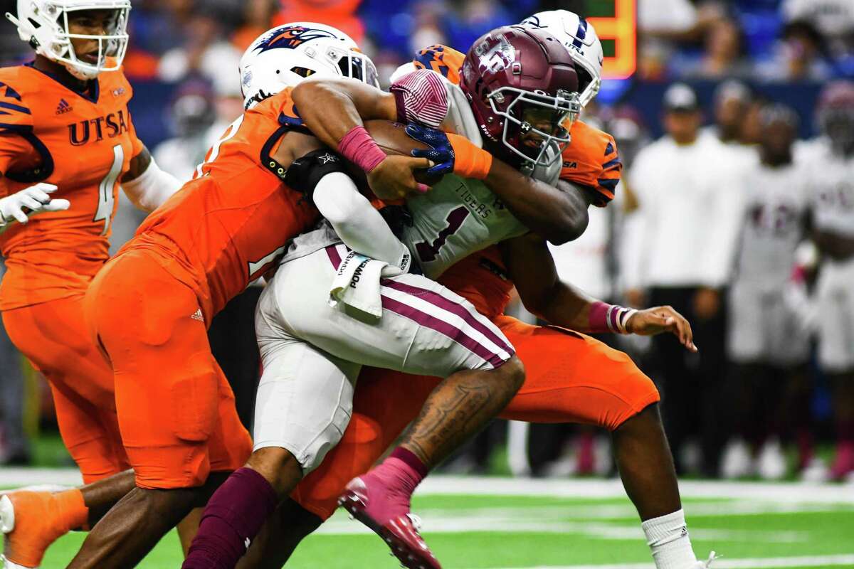 Texas Southern quarterback Andrew Body (1) is sacked by UTSA linebacker Donyai Taylor (12) during the second quarter of Saturday’s game at the Alamodome.