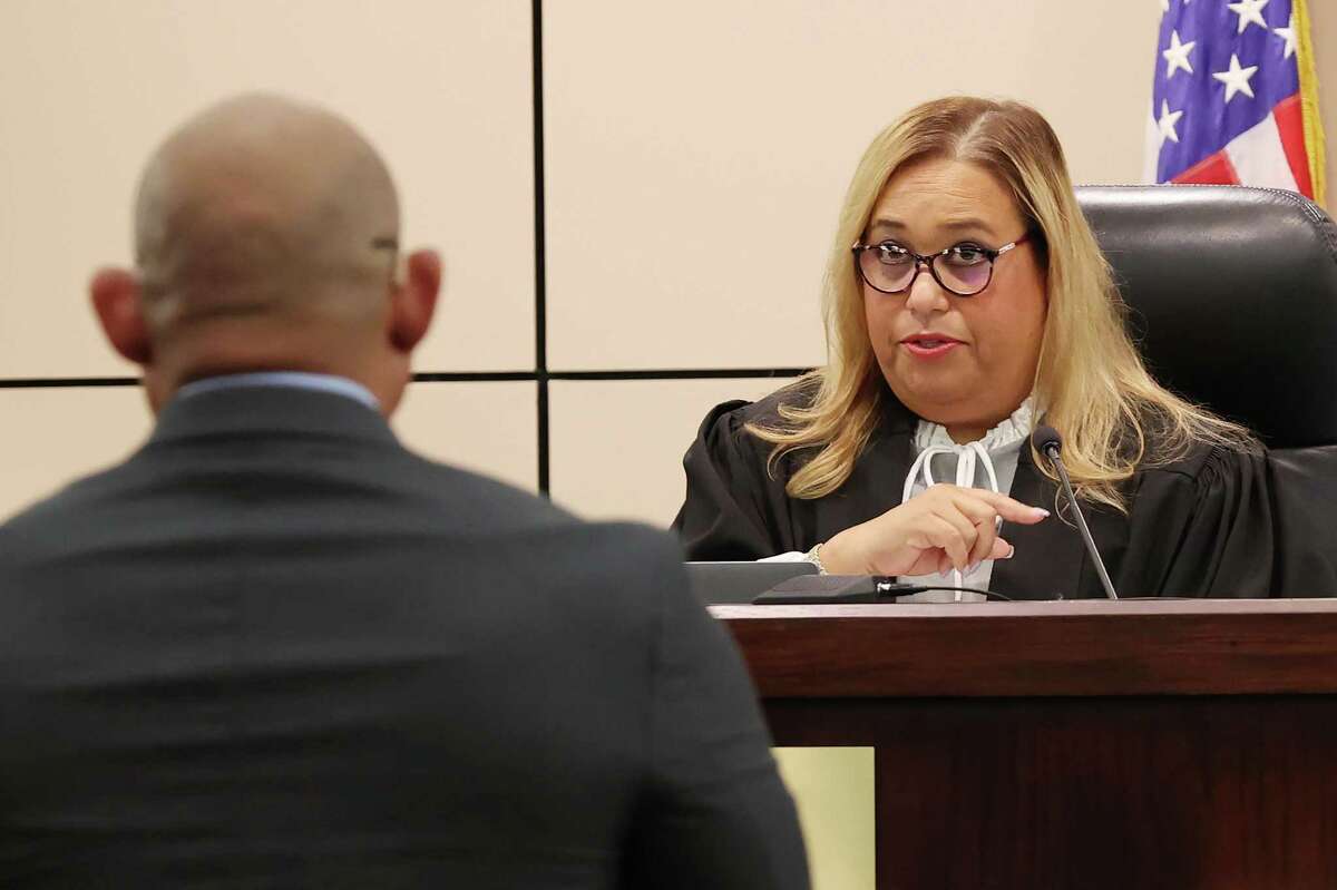 State District Judge Velia J. Meza admonishes Marc Duane Garcia after he was sworn in Wednesday as a prosecution witness in the sentencing phase of Michelle Barrientes Vela’s trial. Vela is a former Bexar County constable convicted of evidence tampering. Garcia was a captain in her office who was also charged.