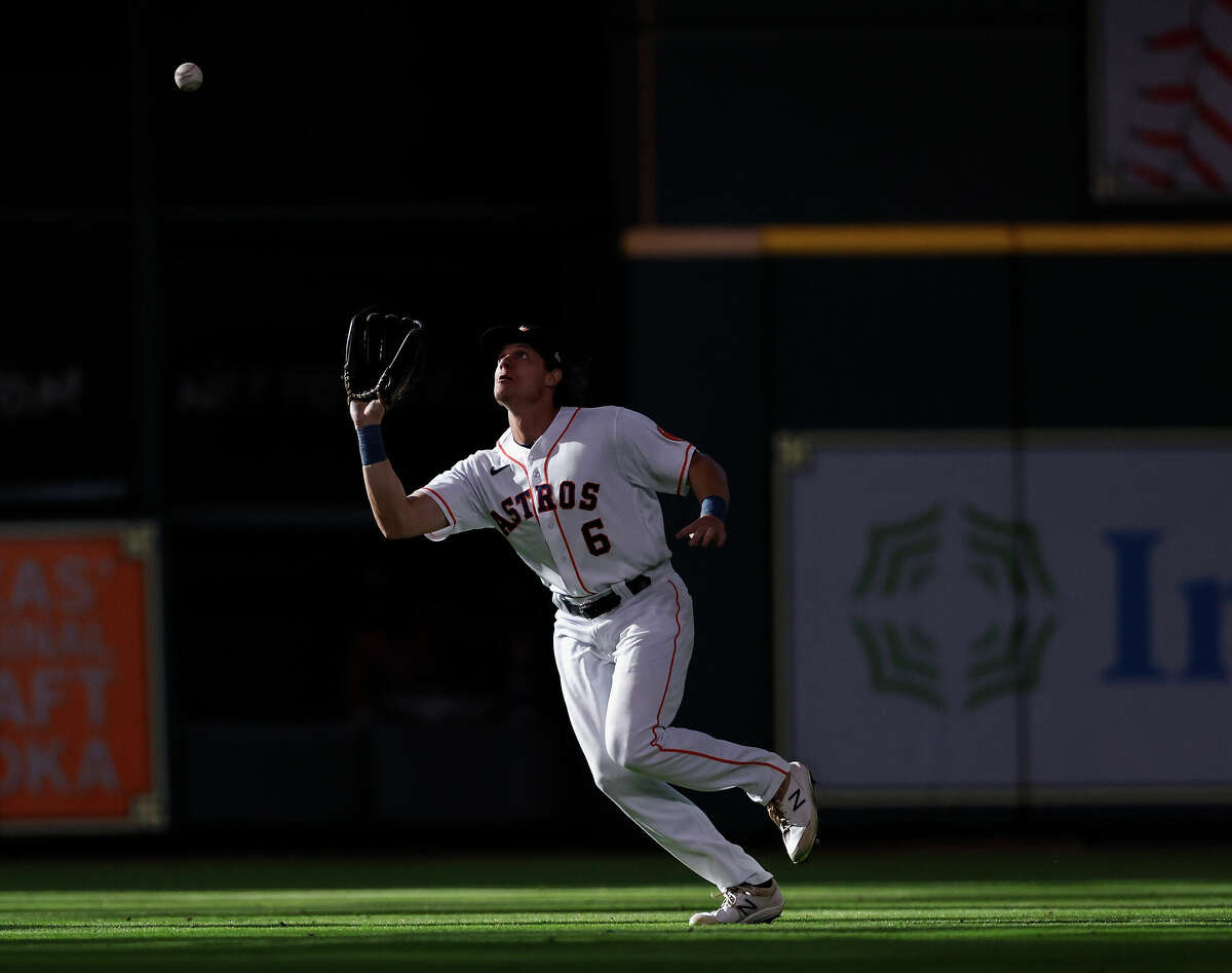 Jake Meyers of the Houston Astros catches a fly ball in the seventh inning against the Philadelphia Phillies at Minute Maid Park on October 05, 2022 in Houston, Texas. The lights briefly went out at the stadium Wednesday afternoon. 