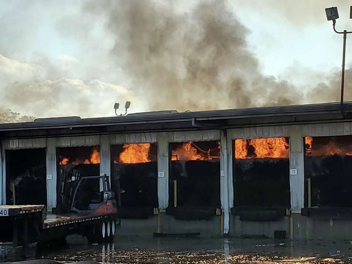 A fire damaged a warehouse and trailers on Blaffer Street in Houston on Wednesday, Oct. 5, 2022.