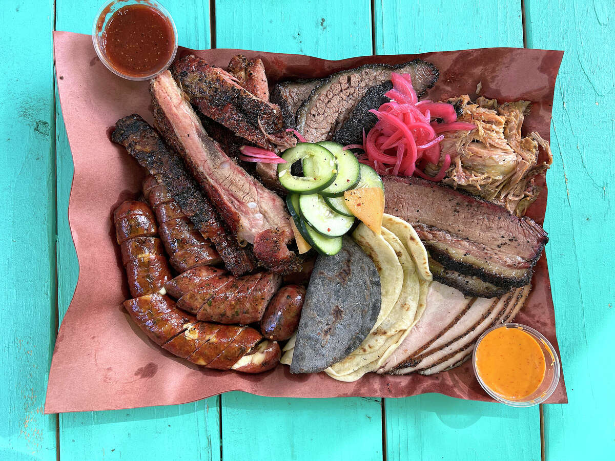 Barbecue options at Reese Bros Barbecue include, clockwise from top left, pork ribs, moist brisket, pulled pork, lean brisket, turkey, handmade corn and flour tortillas, queso fundido sausage, Texas and Polish sausage. 