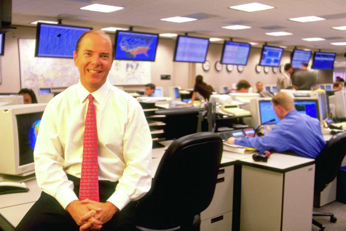 Enron Chief Executive Jeff Skilling poses together on the trading floor in March 1999 in Houston, TX.