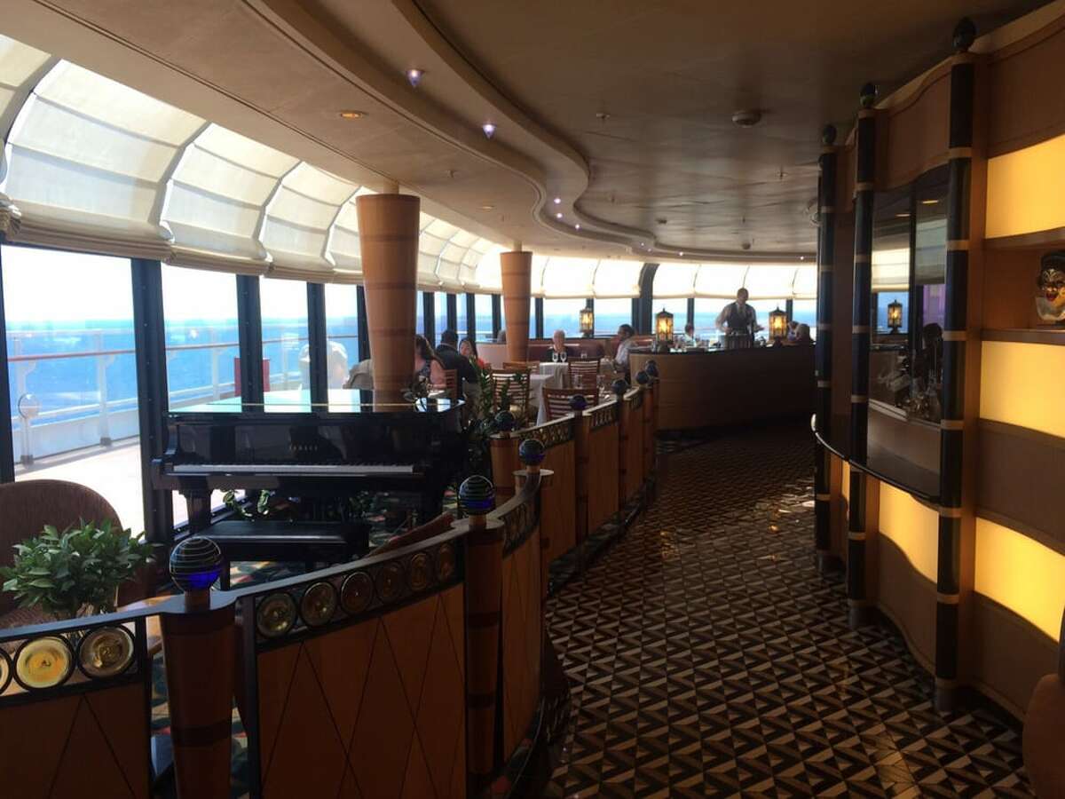 Passengers dine at Palo, the adults-only restaurant aboard the Disney Wonder. Adults traveling with kids can have them taken care of at one of the age-appropriate nurseries or play areas while they eat brunch or dinner.